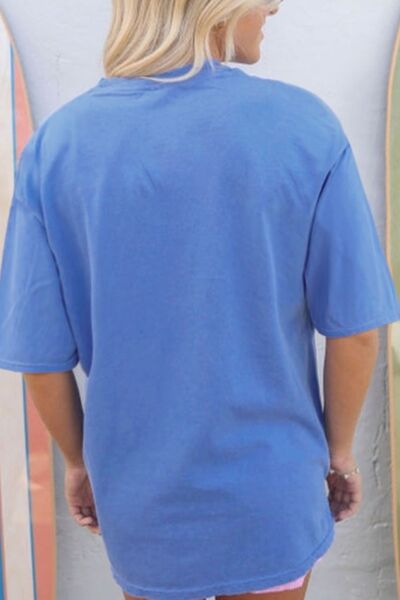 graphic round neck tee, western print t-shirt, short sleeve graphic tee, women’s western shirt, versatile western tee, cowgirl graphic tee, classic western top