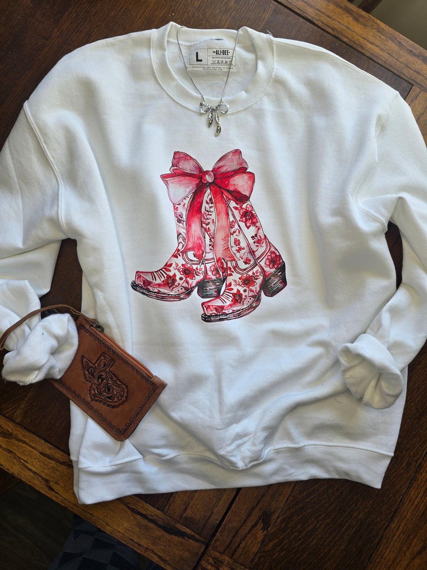 red boots sweater, western boot graphic sweater, cowgirl pullover, women’s graphic sweater, western sweater women, country western fashion, boot print sweater